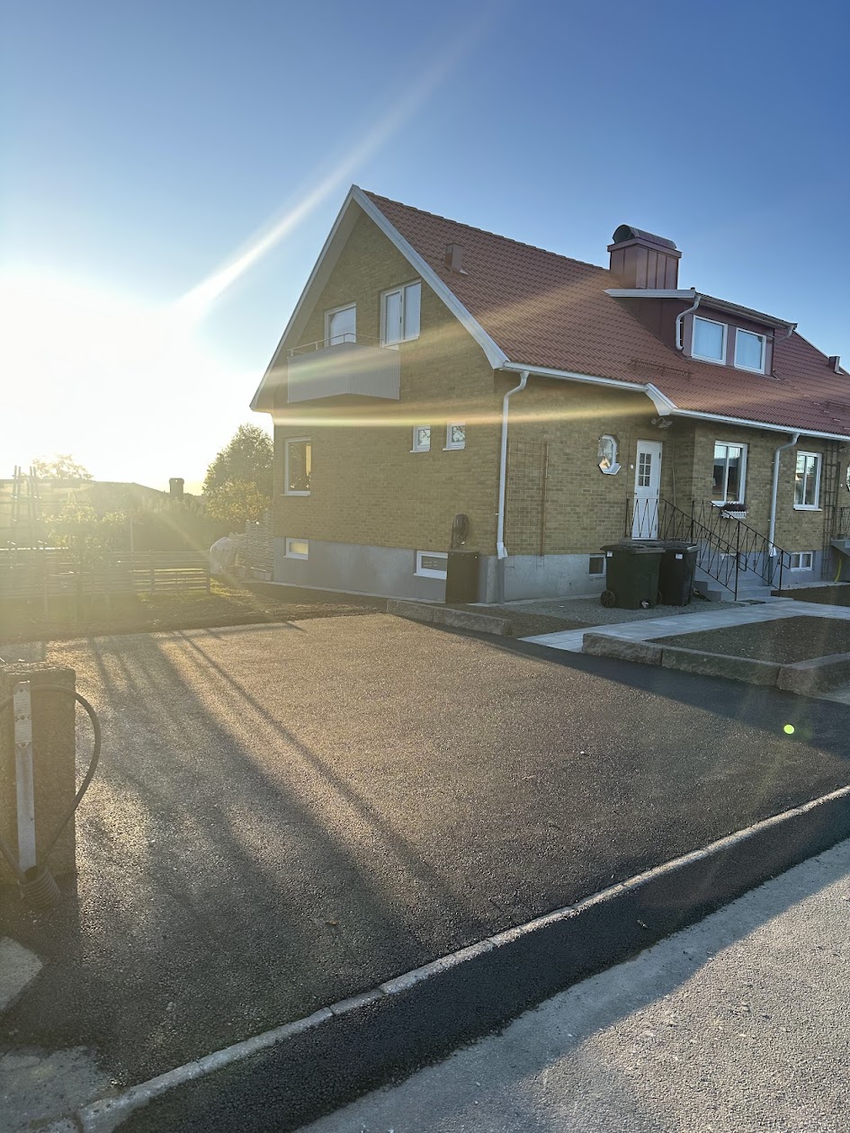 Nässjö asfalt justering garageuppfart plattor granit